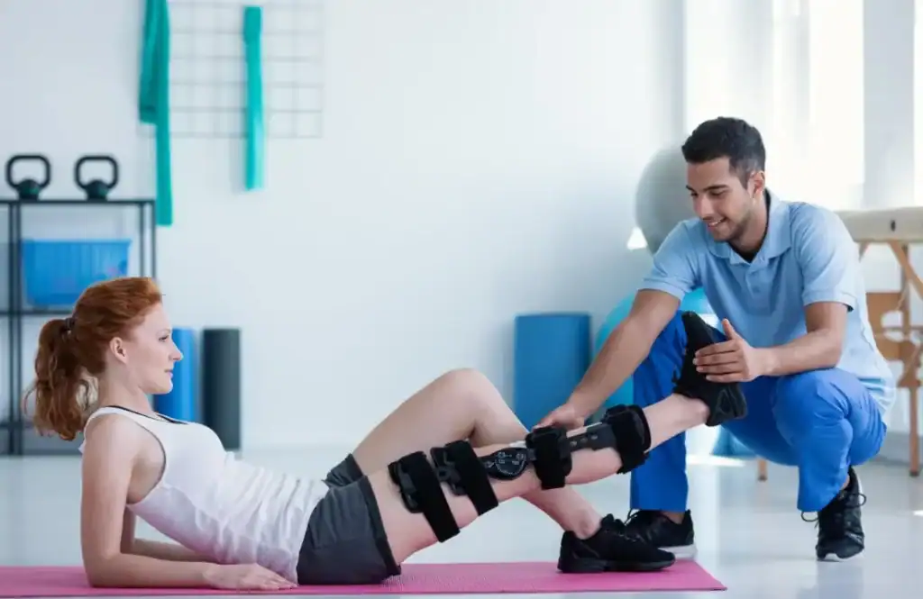 Woman having treatment to help muscle recovery Belper after an injury